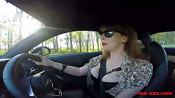 British mature Red fingers her cunt in the motor again